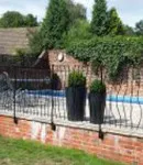 Iron gates around swimming pool